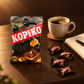 Kopiko Kaffee-Bonbons 150g – Packung mit Bonbons am Schreibtisch