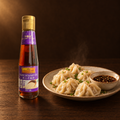 Lee Kum Kee Minyak Wijen Sesamöl 207 ml – Flasche mit Dim Sum und Dip