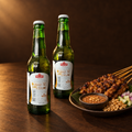 Bali Hai Premium Munich Lager 330 ml – Flasche mit Sate-Spießen